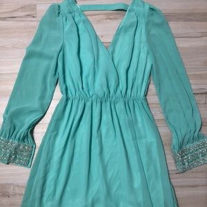Short teal dress.
